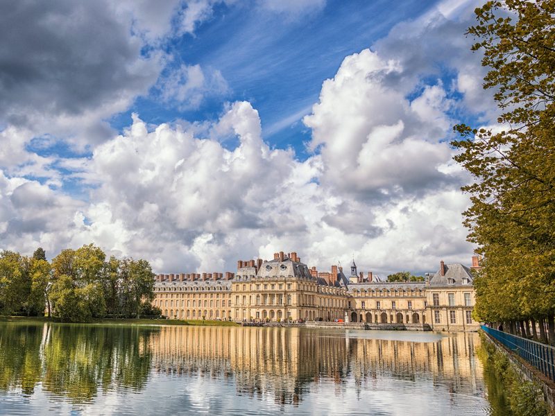 Chateau de Fontainebleau reflected in the pond